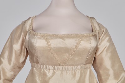 Lot 80 - A blush silk taffeta dress, French, circa 1810