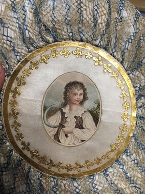 Lot 9 - A blue and ivory silk net purse with printed motifs, English, 1790-1810