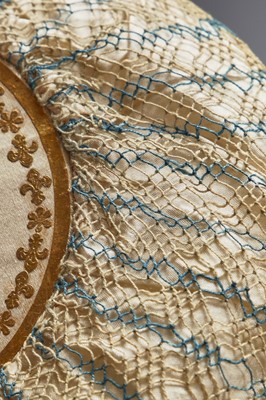 Lot 9 - A blue and ivory silk net purse with printed motifs, English, 1790-1810