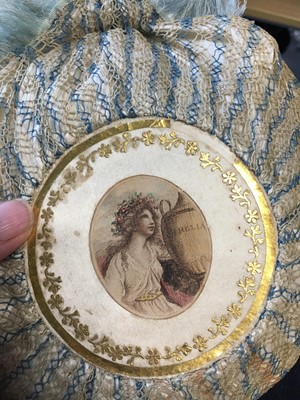 Lot 9 - A blue and ivory silk net purse with printed motifs, English, 1790-1810