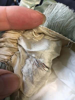 Lot 9 - A blue and ivory silk net purse with printed motifs, English, 1790-1810