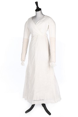 Lot 401 - An embroidered sprigged muslin dress, 1810-15,...