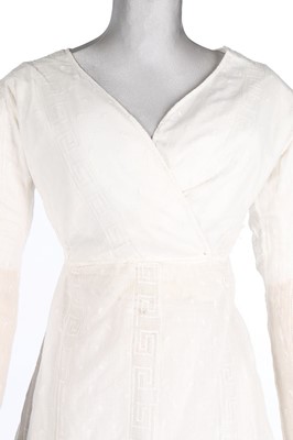 Lot 401 - An embroidered sprigged muslin dress, 1810-15,...