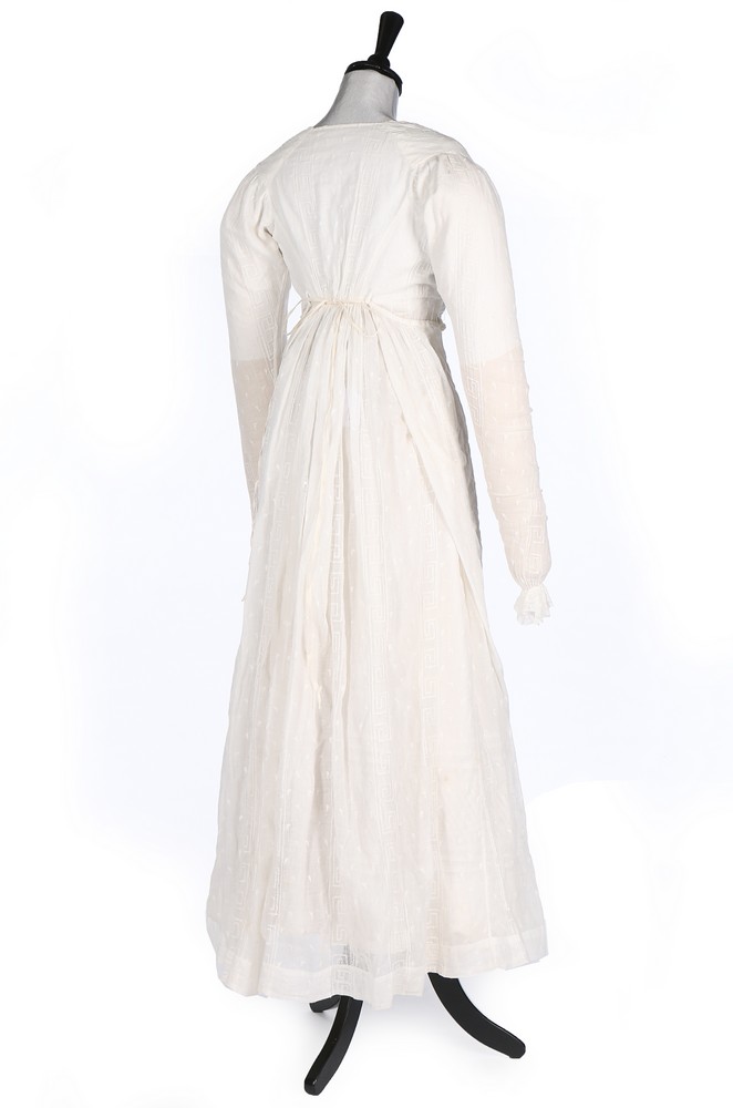 Lot 401 - An embroidered sprigged muslin dress,