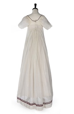 Lot 402 - A muslin dress, 1800-10, empire-line with...