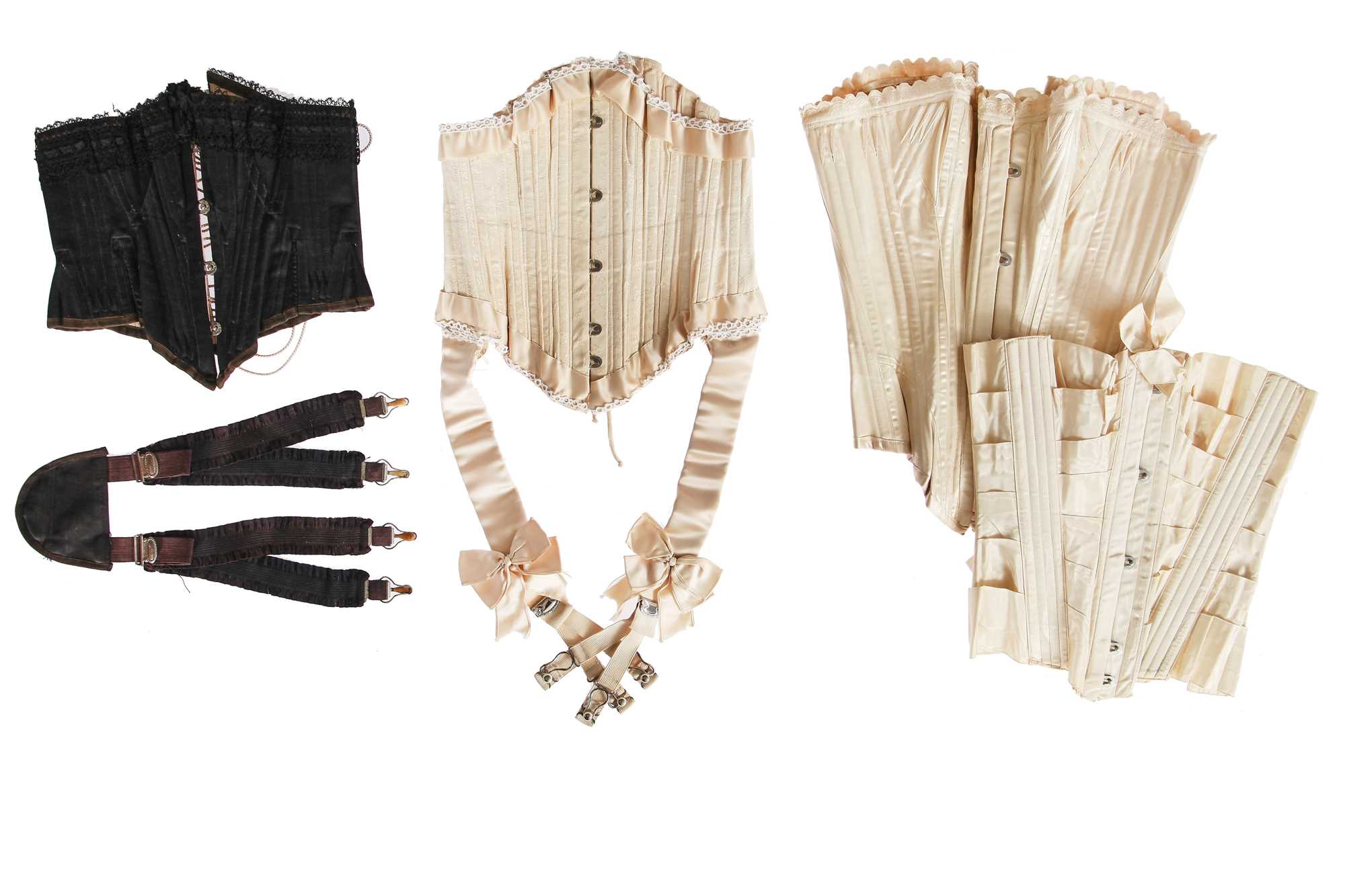Lot 664 - An interesting group of corsets and suspenders, 1880s and later