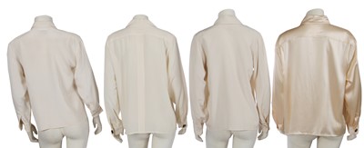 Lot 576 - Mary Quant's Yves Saint Laurent ivory blouses, mainly 1980s