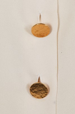 Lot 576 - Mary Quant's Yves Saint Laurent ivory blouses, mainly 1980s