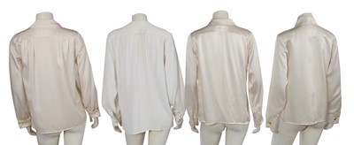 Lot 576 - Mary Quant's Yves Saint Laurent ivory blouses, mainly 1980s