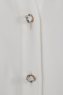 Lot 576 - Mary Quant's Yves Saint Laurent ivory blouses, mainly 1980s