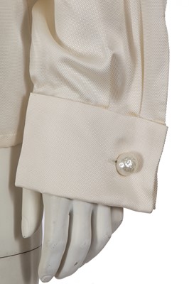 Lot 576 - Mary Quant's Yves Saint Laurent ivory blouses, mainly 1980s