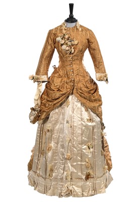 Lot 488 - An ecru silk bridal gown, American, circa 1885