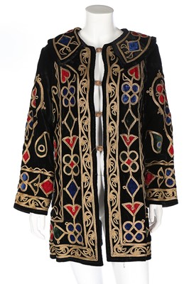 Lot 425 - An embroidered black velvet jacket, North...