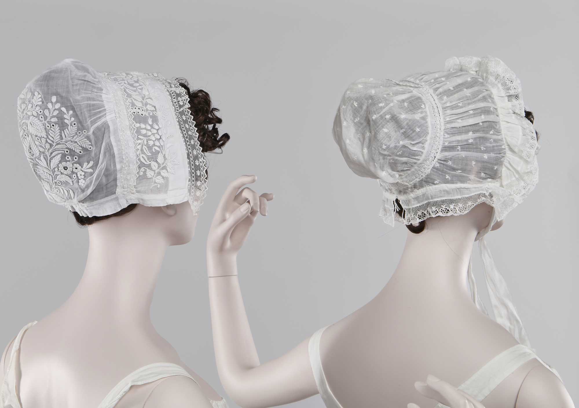 Lot 74 - A group of whitework bonnets and caps, 19th-century