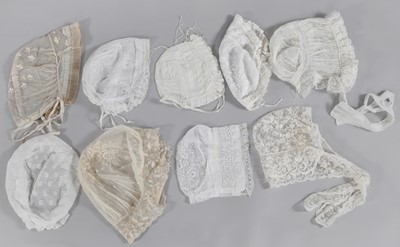 Lot 74 - A group of whitework bonnets and caps, 19th-century