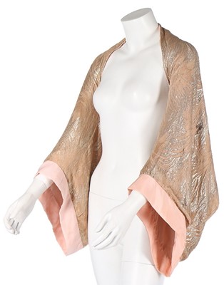 Lot 2 - A pink lamé evening jacket, early 1930s, with...