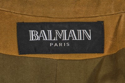 Lot 83 - A Balmain by Christophe Decarnin khaki canvas military-inspired tailcoat, Spring-Summer 2010