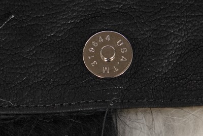 Lot 236 - A Chrome Hearts black and white goat hair clutch, circa 2010