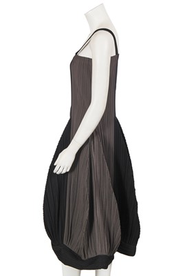 Lot 290 - An Issey Miyake grey and black pleated polyester dress, Autumn-Winter 1990-91