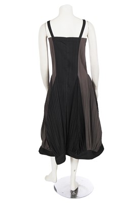 Lot 290 - An Issey Miyake grey and black pleated polyester dress, Autumn-Winter 1990-91