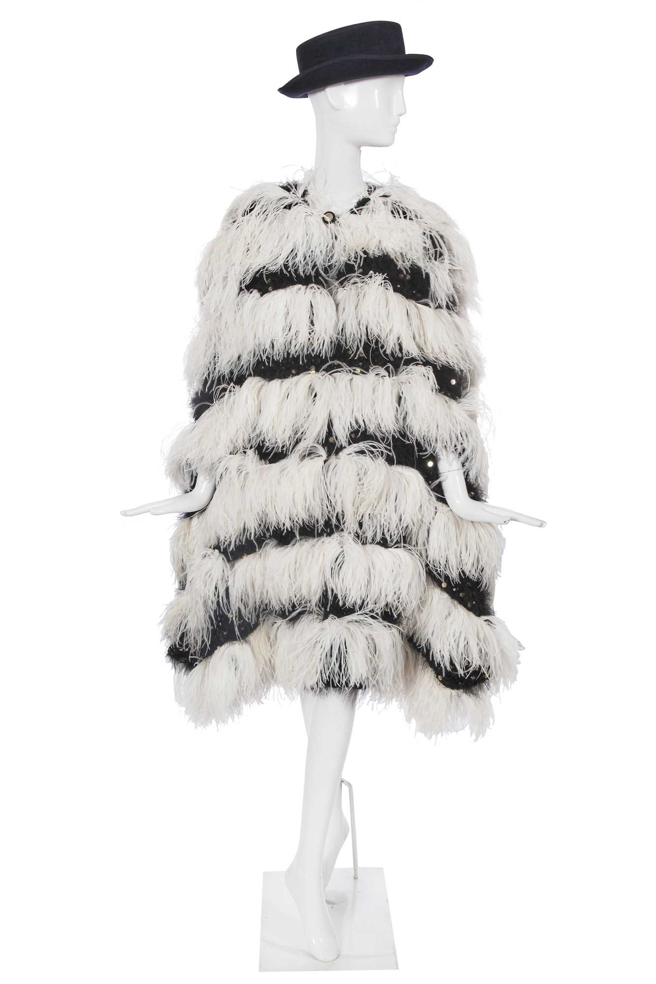 Lot 17 - A Chanel by Karl Lagerfeld black and white fantasy tweed and ostrich feather cloak, 'Paris-Dallas' collection, Métiers d'Art, Pre-Fall 2014