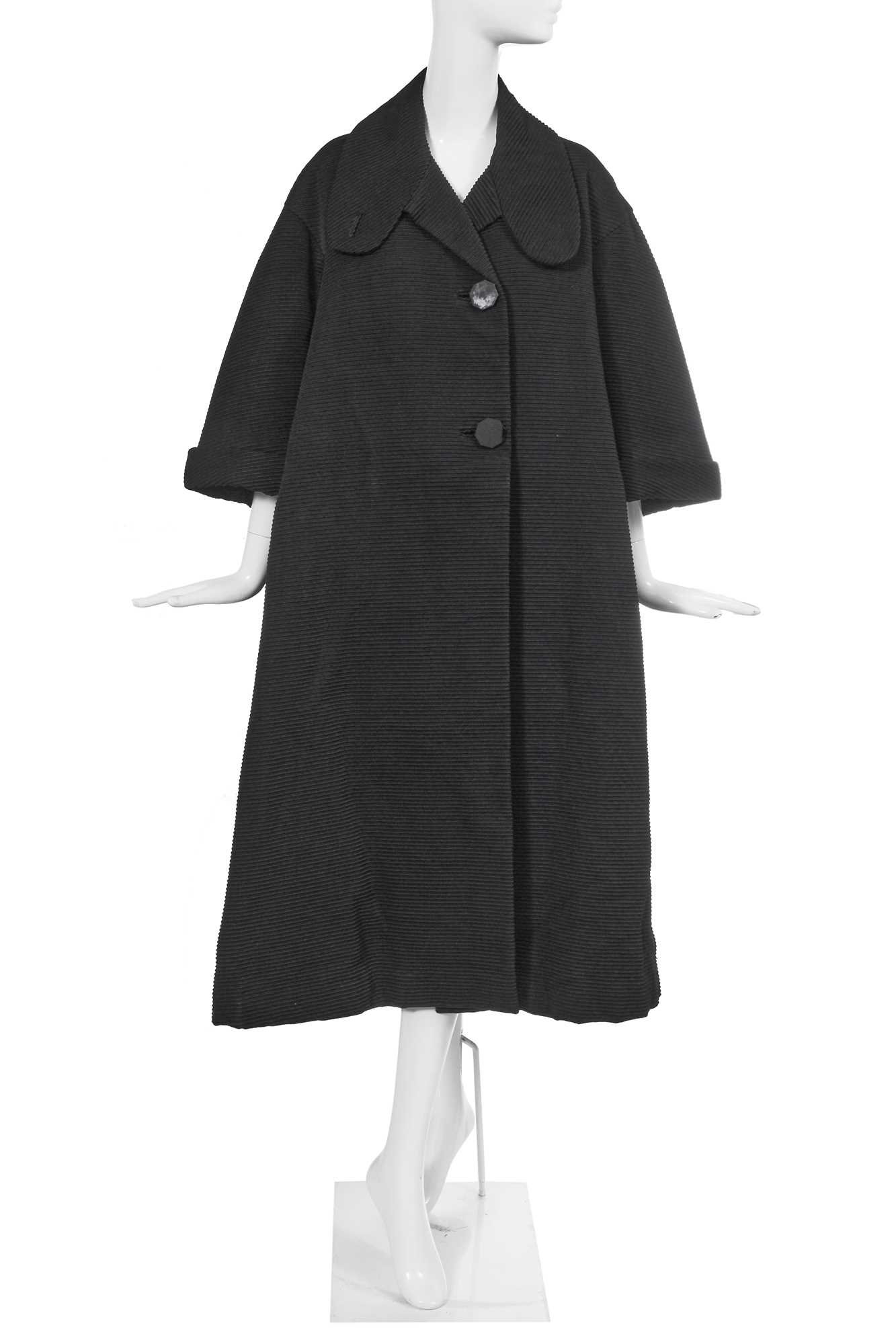 Lot 432 - A Christian Dior haute couture black silk swagger coat, Autumn-Winter 1952-53