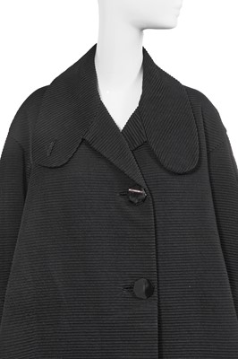 Lot 432 - A Christian Dior haute couture black silk swagger coat, Autumn-Winter 1952-53