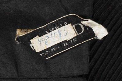 Lot 432 - A Christian Dior haute couture black silk swagger coat, Autumn-Winter 1952-53