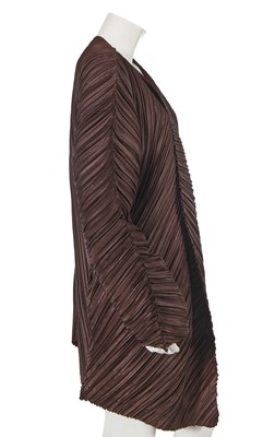 Lot 288 - An Issey Miyake brown pleated polyester coat, Spring-Summer 1995