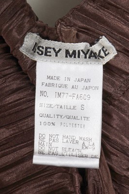Lot 288 - An Issey Miyake brown pleated polyester coat, Spring-Summer 1995