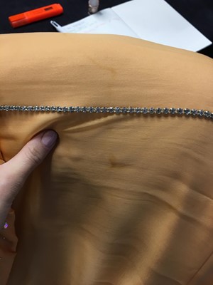 Lot 515 - A Loris Azzaro apricot jersey and chiffon ensemble, 1970s