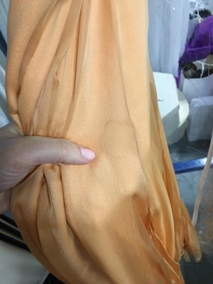 Lot 515 - A Loris Azzaro apricot jersey and chiffon ensemble, 1970s