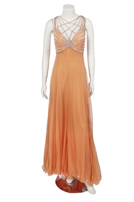 Lot 515 - A Loris Azzaro apricot jersey and chiffon ensemble, 1970s