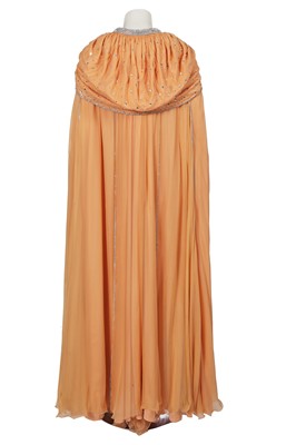 Lot 515 - A Loris Azzaro apricot jersey and chiffon ensemble, 1970s