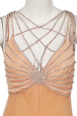 Lot 515 - A Loris Azzaro apricot jersey and chiffon ensemble, 1970s