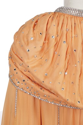 Lot 515 - A Loris Azzaro apricot jersey and chiffon ensemble, 1970s