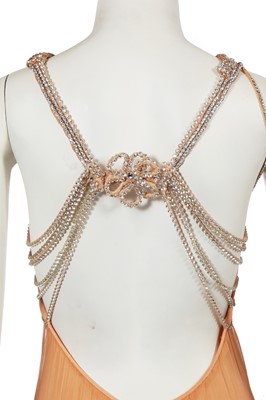 Lot 515 - A Loris Azzaro apricot jersey and chiffon ensemble, 1970s