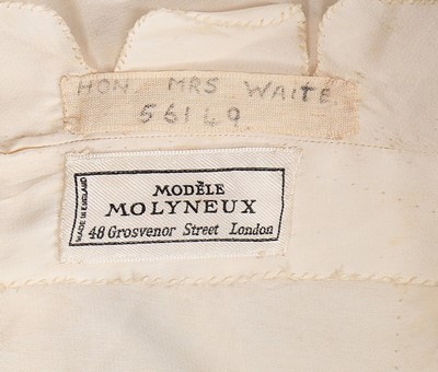 Lot 74 - A Molyneux couture ivory silk grosgrain...