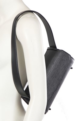 Lot 174 - A Louis Vuitton black Epi leather Nocturne bag, 1990s