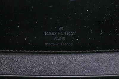 Lot 174 - A Louis Vuitton black Epi leather Nocturne bag, 1990s
