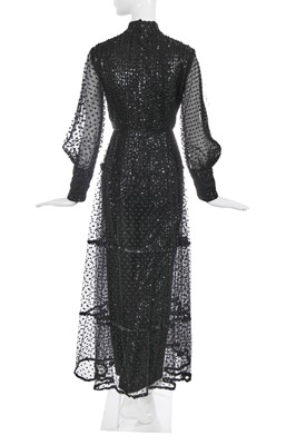 Lot 384 - An Oscar de la Renta sequined black rayon jumpsuit, circa 1970