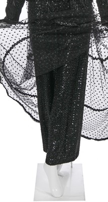 Lot 384 - An Oscar de la Renta sequined black rayon jumpsuit, circa 1970