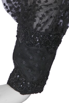 Lot 384 - An Oscar de la Renta sequined black rayon jumpsuit, circa 1970