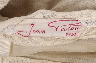 Lot 24 - A Jean Patou chinoiserie brocaded satin gown,...