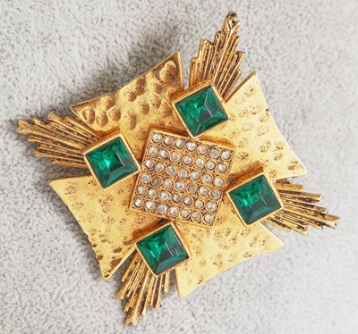 Lot 529 - Three Yves Saint Laurent gilt brooches, 1970s