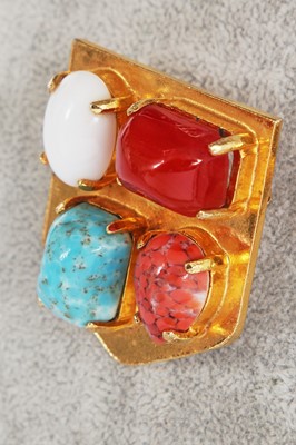 Lot 529 - Three Yves Saint Laurent gilt brooches, 1970s