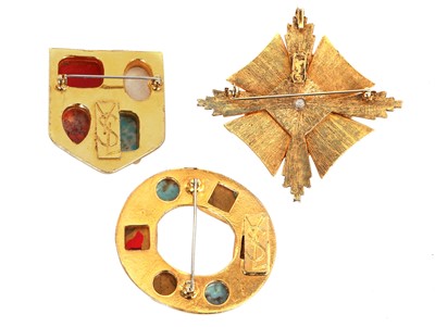 Lot 529 - Three Yves Saint Laurent gilt brooches, 1970s