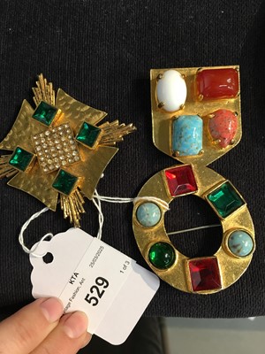Lot 529 - Three Yves Saint Laurent gilt brooches, 1970s