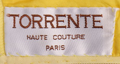 Lot 69 - A Torrente couture yellow worsted mini-dress,...