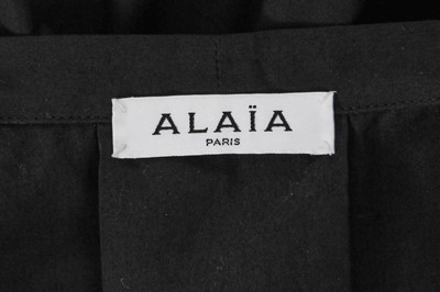 Lot 276 - An Azzedine Alaïa black cotton cocktail dress, probably 2000s